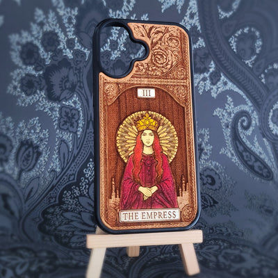 Deep laser engraved wooden phone case featuring The Empress tarot card with mystical celestial details on natural wood for iPhone and Samsung Galaxy models.