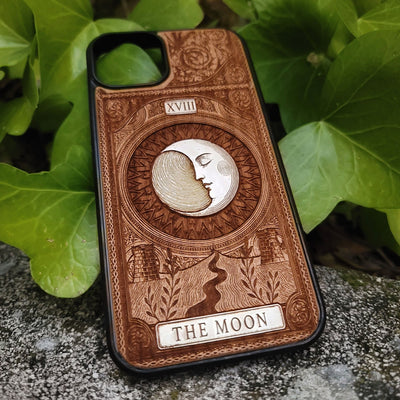 Handmade wooden phone case featuring The Moon tarot card design, laser engraved and hand-painted. Fits iPhone , 15, 14, 13, 12 Pro Max and Samsung Galaxy S, S24, S23, S22 Ultra and Plus models.