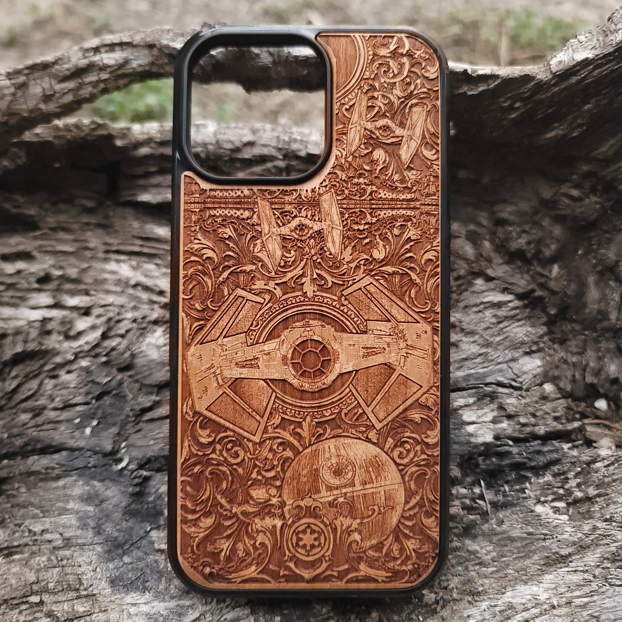 Star Wars wooden phone case with detailed TIE Fighter and Death Star carvings. Designed for iPhone  and Samsung Galaxy S, perfect for fans of the Star Wars saga looking for a unique and durable phone accessory.