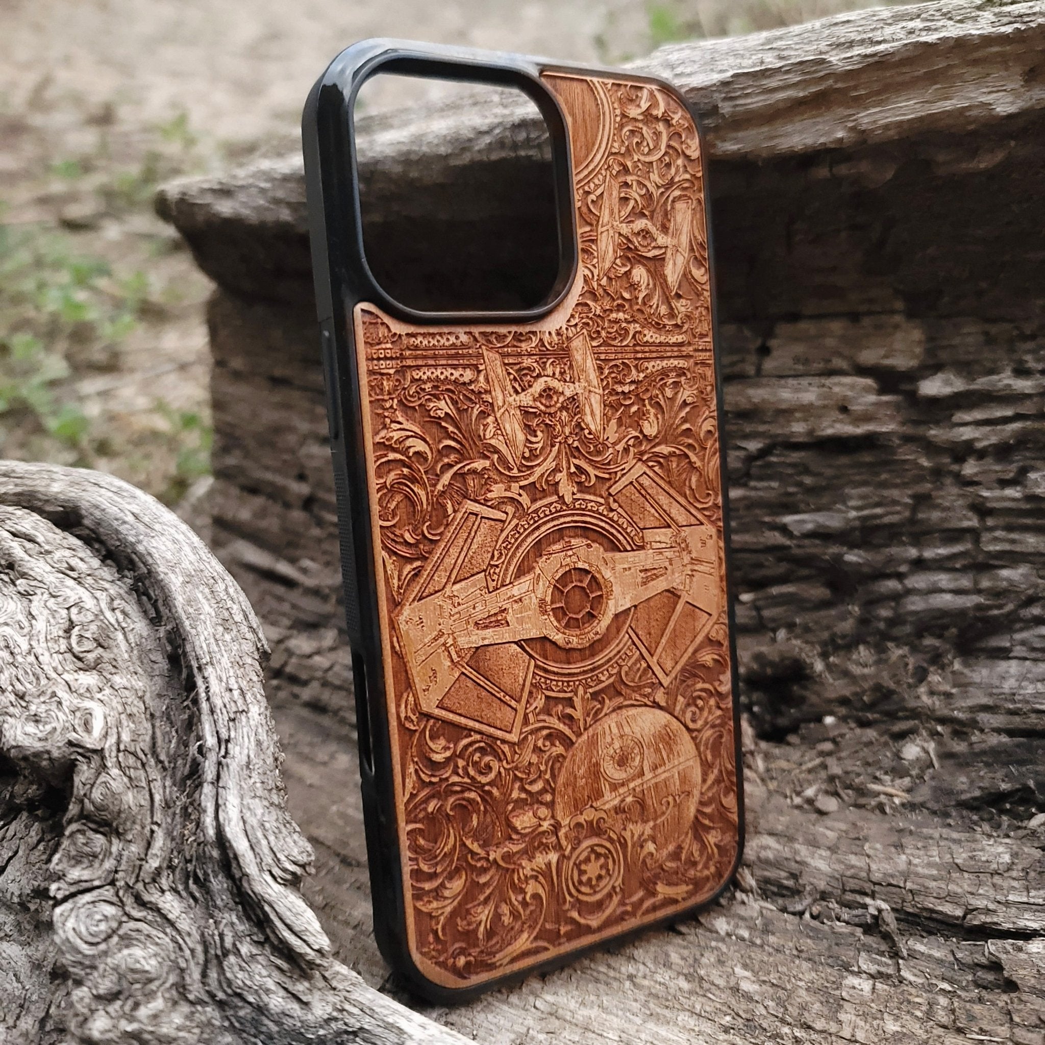 Star Wars wooden phone case with detailed TIE Fighter and Death Star carvings. Designed for iPhone  and Samsung Galaxy S, perfect for fans of the Star Wars saga looking for a unique and durable phone accessory.