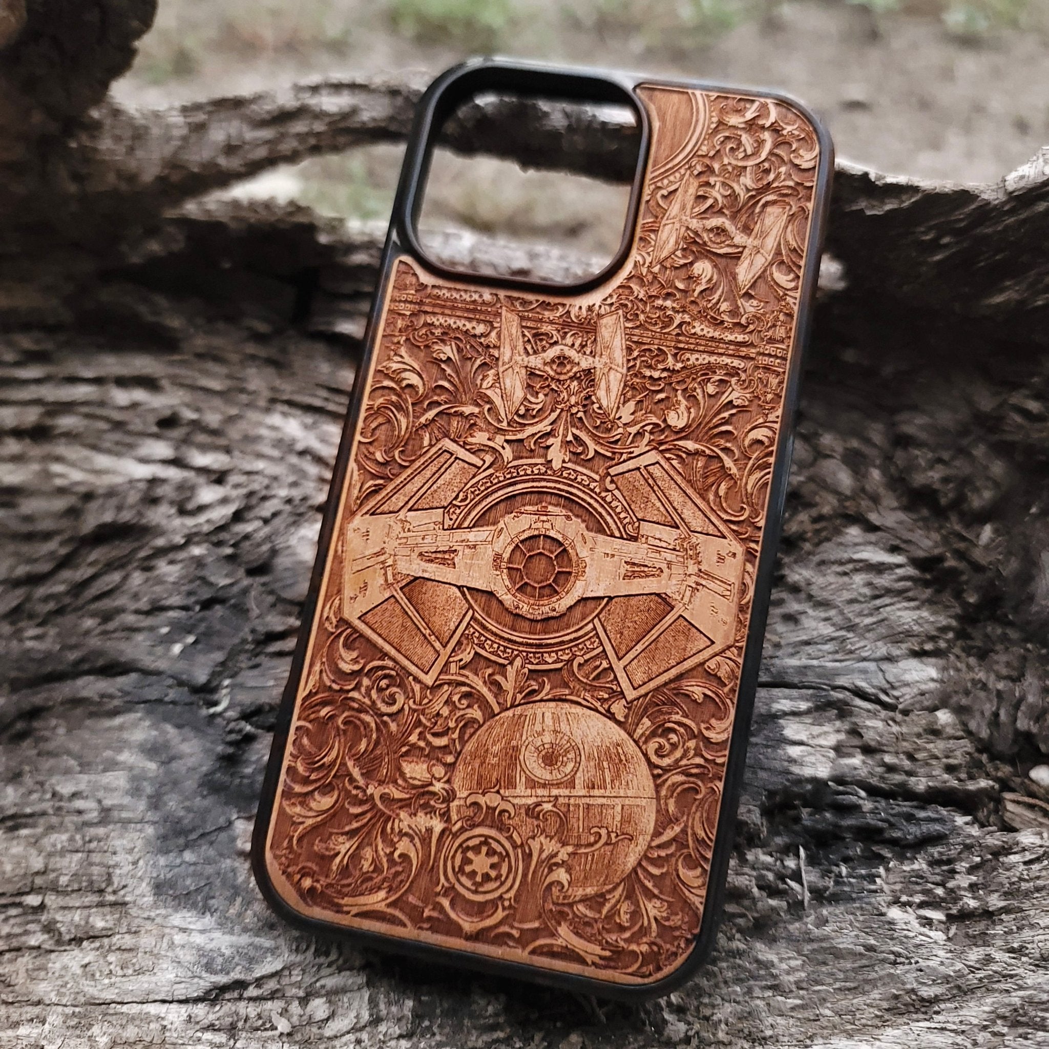 Star Wars wooden phone case with detailed TIE Fighter and Death Star carvings. Designed for iPhone  and Samsung Galaxy S, perfect for fans of the Star Wars saga looking for a unique and durable phone accessory.