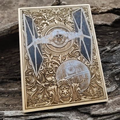 Laser-engraved Star Wars Tie Fighter artwork on wood