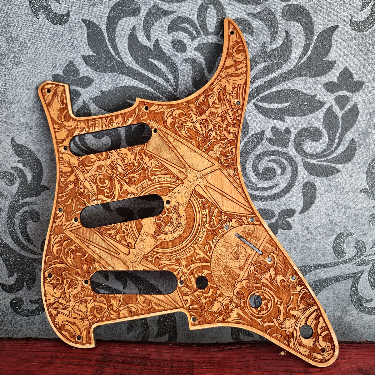 Custom wooden guitar pickguard with personalized laser engraved artwork