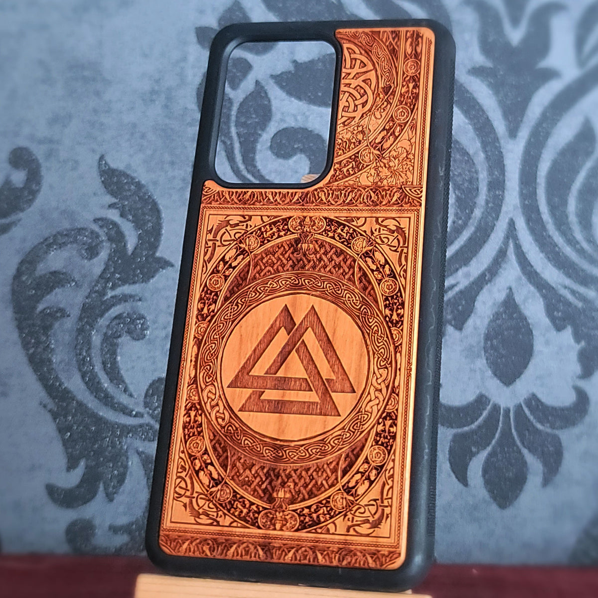Viking symbol phone case featuring Valknut artwork on natural cherrywood