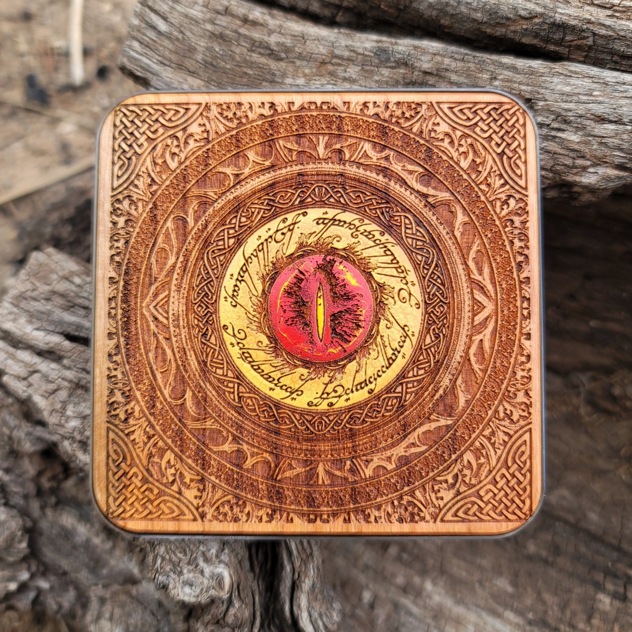 Dark wood wireless charger with Lord of the Rings Eye of Sauron.