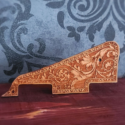 Wooden Les Paul pickguard with detailed ornamental scrollwork laser engraving