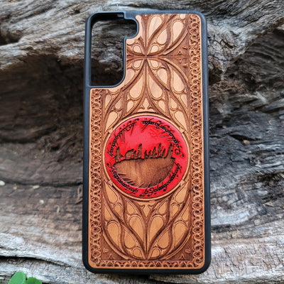 Lord of the Rings-inspired wood phone case featuring a custom symbol design, laser-engraved for a unique touch. Compatible with iPhone , 15, 14, 13, 12, 11 Pro Max Mini, and Samsung Galaxy S, S24, S23, S22, S21, S20 Ultra, Plus, Note 20. Perfect for fans of Tolkien’s world, blending style, protection, and fandom.