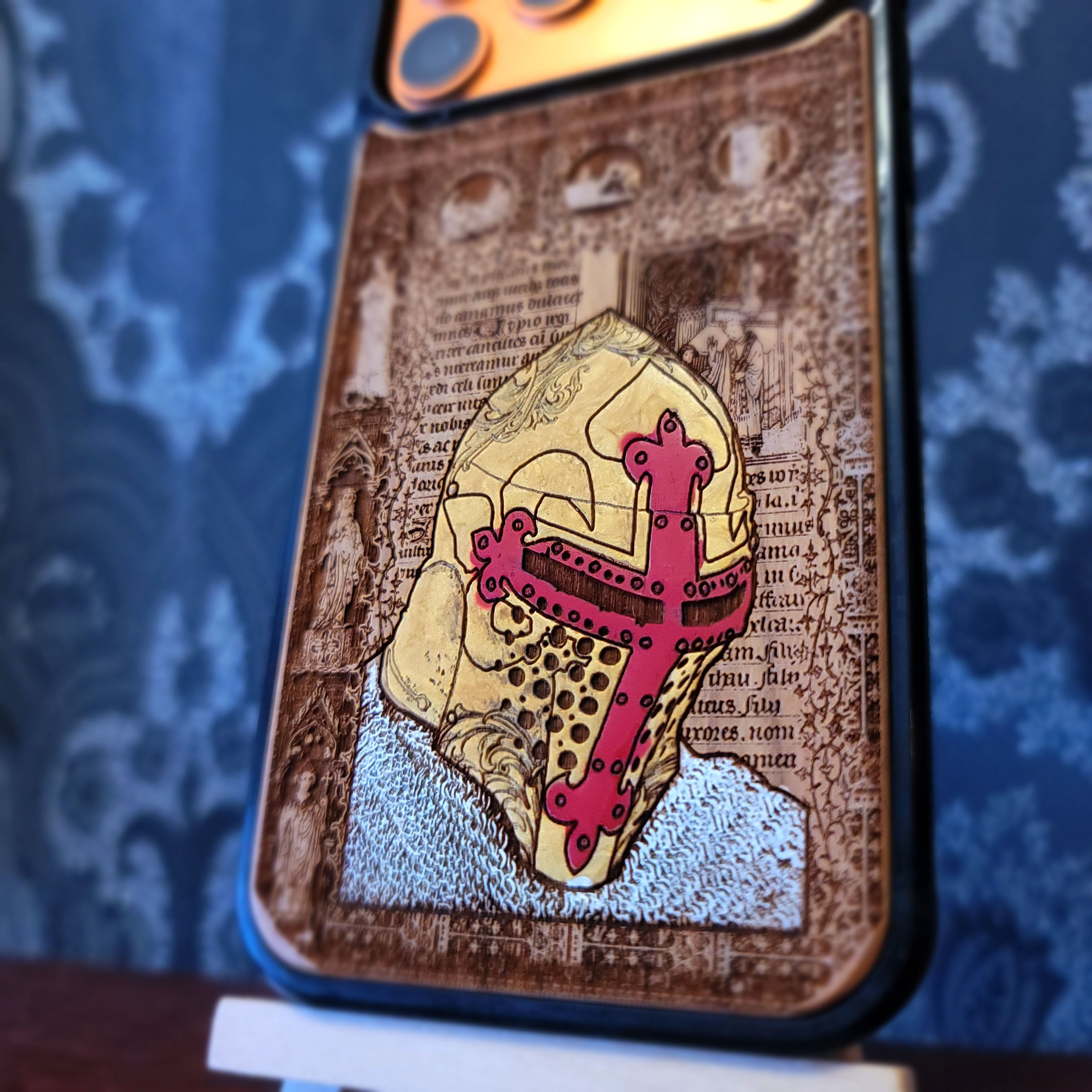 Deep laser engraved wooden phone case featuring a medieval knight in armor on natural wood for iPhone and Samsung Galaxy models.