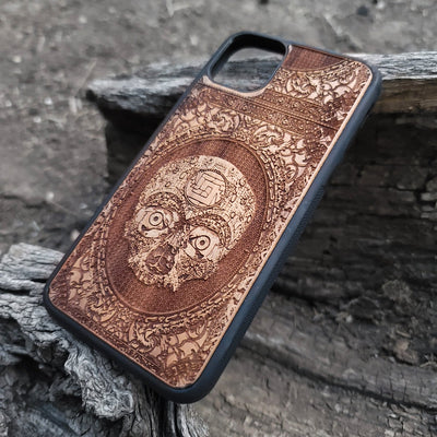 Aztec Skull wooden phone case featuring a detailed laser-engraved design. Compatible with iPhone , iPhone 15, Galaxy S, Note 20, and other popular models. Ideal for fans of gothic, dark, and ancient art designs