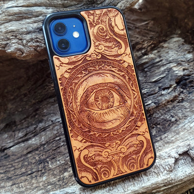 Wooden phone case with an intricate human eye design, featuring detailed gothic art. Compatible with iPhone , iPhone 15, Galaxy S23 Ultra, Note 20, and more. Ideal for lovers of dark fantasy and custom phone accessories.