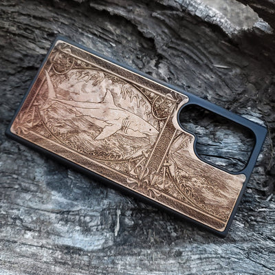 Wooden phone case featuring a detailed Great White Shark skeleton design, handcrafted for iPhone , iPhone 15, Galaxy S, S24, and more. Ideal for shark fans and lovers of gothic and dark fantasy designs.