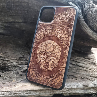 Aztec Skull wooden phone case featuring a detailed laser-engraved design. Compatible with iPhone , iPhone 15, Galaxy S, Note 20, and other popular models. Ideal for fans of gothic, dark, and ancient art designs