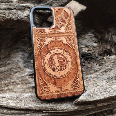 Intricate gothic skeleton artwork engraved on a wooden phone case, compatible with iPhone  and Samsung Galaxy S.