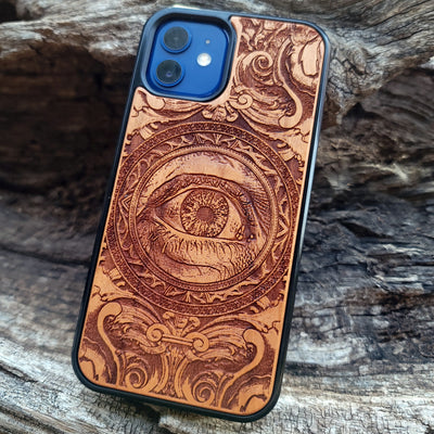 Wooden phone case with an intricate human eye design, featuring detailed gothic art. Compatible with iPhone , iPhone 15, Galaxy S23 Ultra, Note 20, and more. Ideal for lovers of dark fantasy and custom phone accessories.