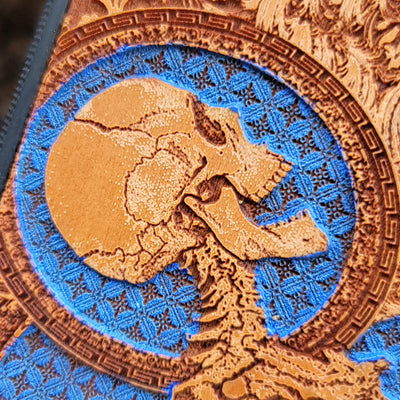 Hand-finished cherry wood phone case with intricate laser-engraved Gothic skeleton art for iPhone & Samsung Galaxy.