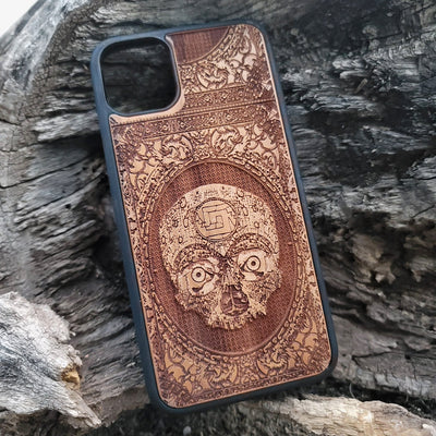 Aztec Skull wooden phone case featuring a detailed laser-engraved design. Compatible with iPhone , iPhone 15, Galaxy S, Note 20, and other popular models. Ideal for fans of gothic, dark, and ancient art designs