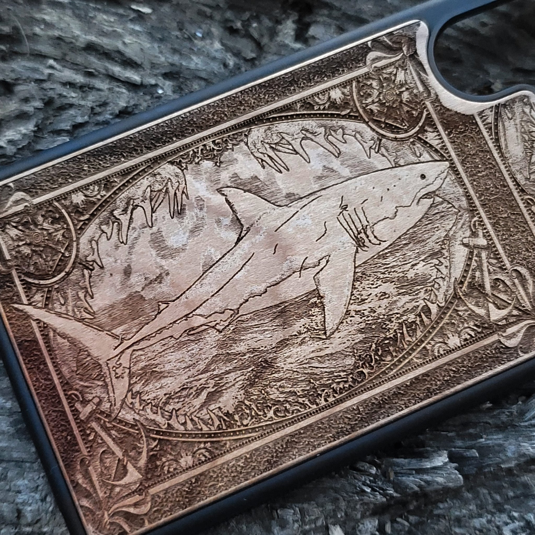 Wooden phone case featuring a detailed Great White Shark skeleton design, handcrafted for iPhone , iPhone 15, Galaxy S, S24, and more. Ideal for shark fans and lovers of gothic and dark fantasy designs.