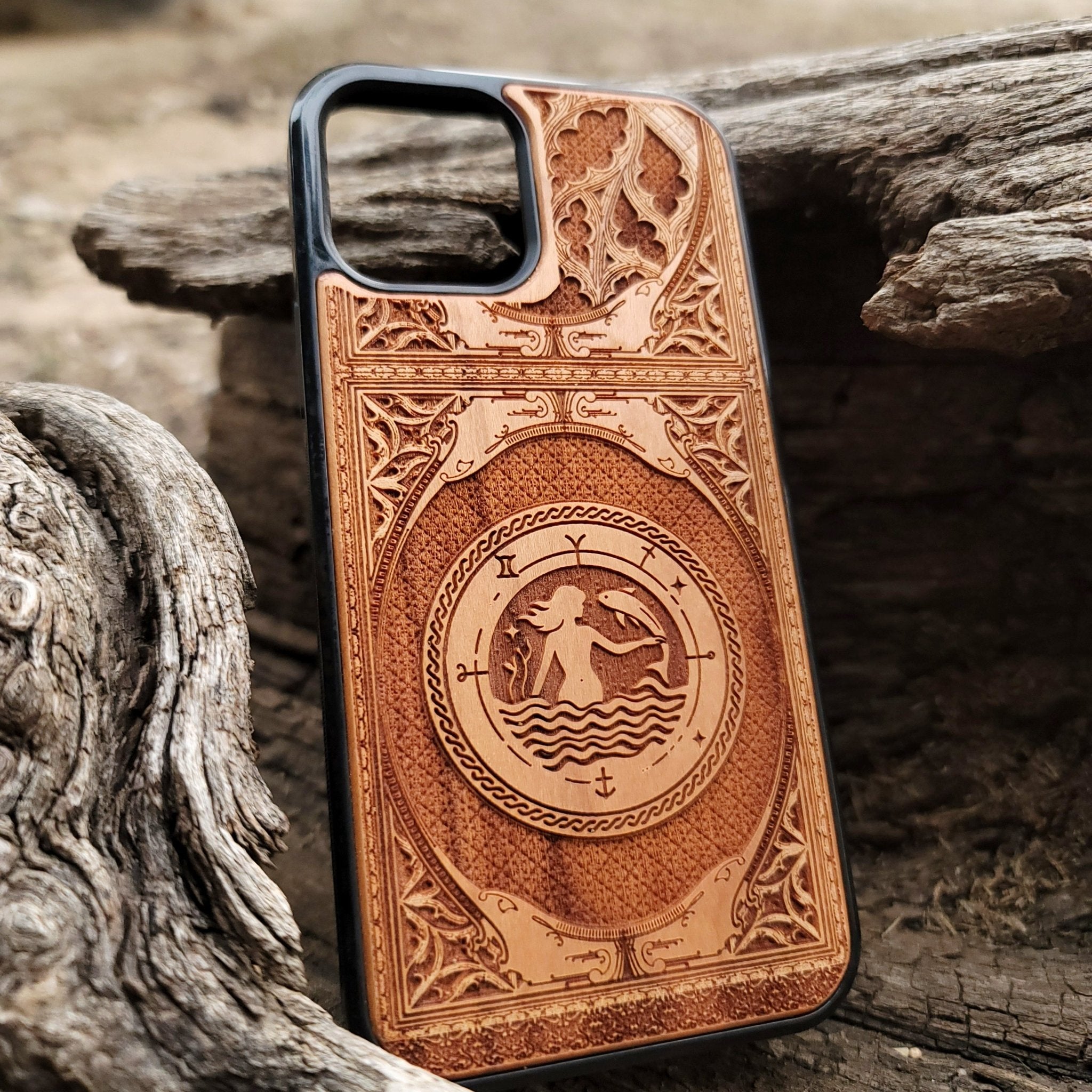 Intricate gothic skeleton artwork engraved on a wooden phone case, compatible with iPhone  and Samsung Galaxy S.