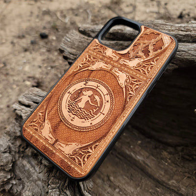 Intricate gothic skeleton artwork engraved on a wooden phone case, compatible with iPhone  and Samsung Galaxy S.