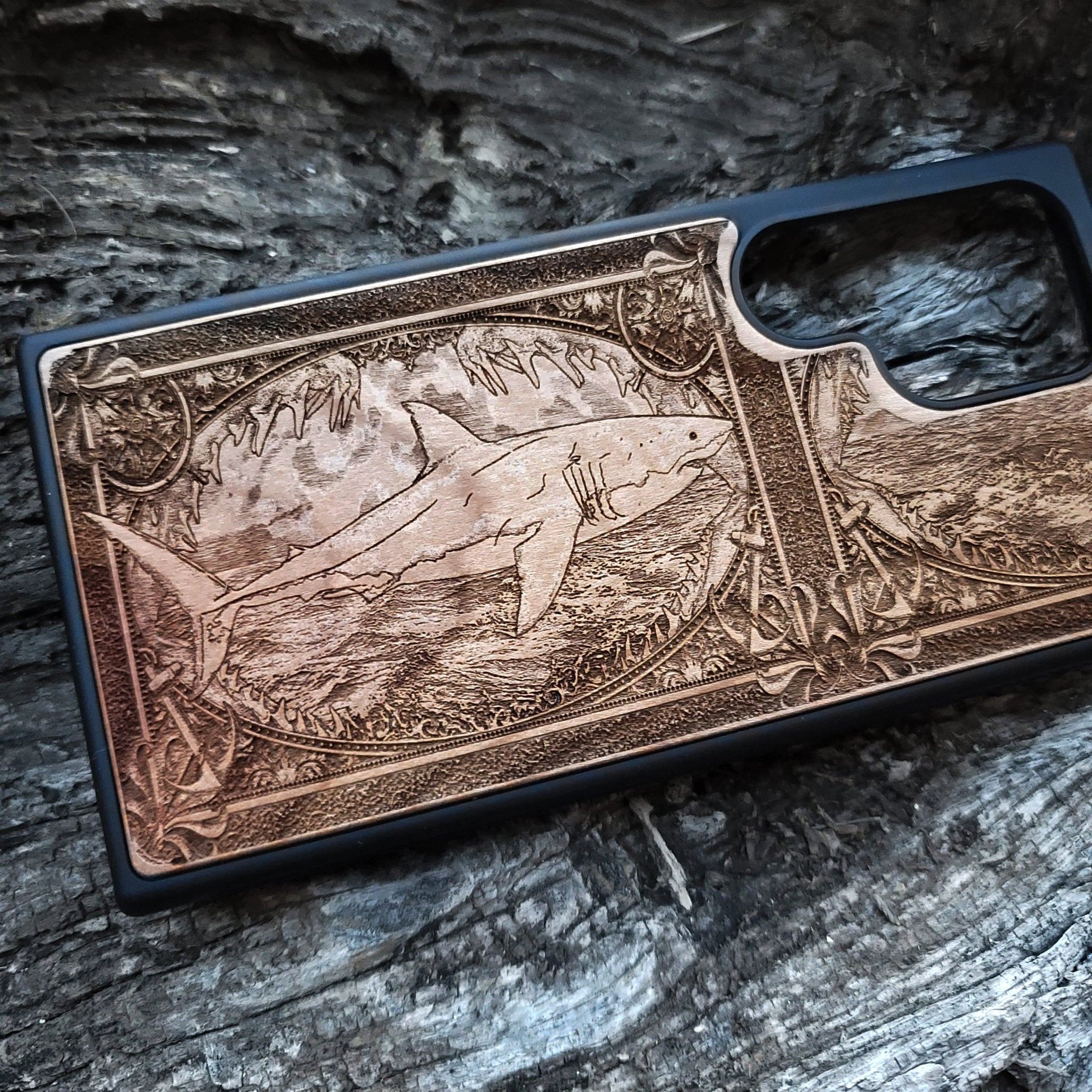 Wooden phone case featuring a detailed Great White Shark skeleton design, handcrafted for iPhone , iPhone 15, Galaxy S, S24, and more. Ideal for shark fans and lovers of gothic and dark fantasy designs.