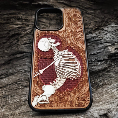 Hand-painted gothic pattern wooden phone case with gold accents, laser-engraved on cherrywood. Fits iPhone 11- and Galaxy S20-S.