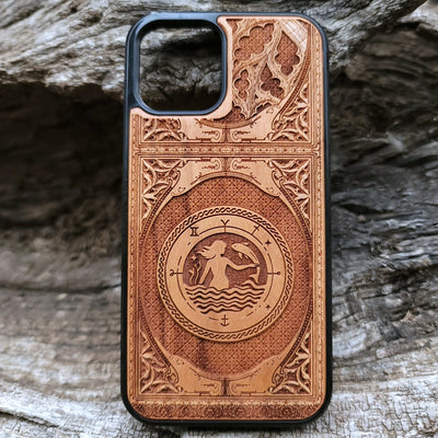 Intricate gothic skeleton artwork engraved on a wooden phone case, compatible with iPhone  and Samsung Galaxy S.