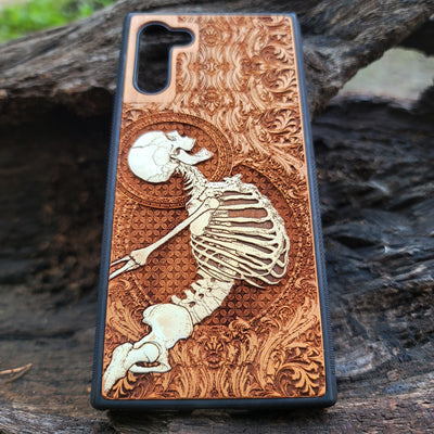 Gothic skeleton warrior artwork engraved on a wooden phone case, compatible with iPhone  and Samsung Galaxy S.