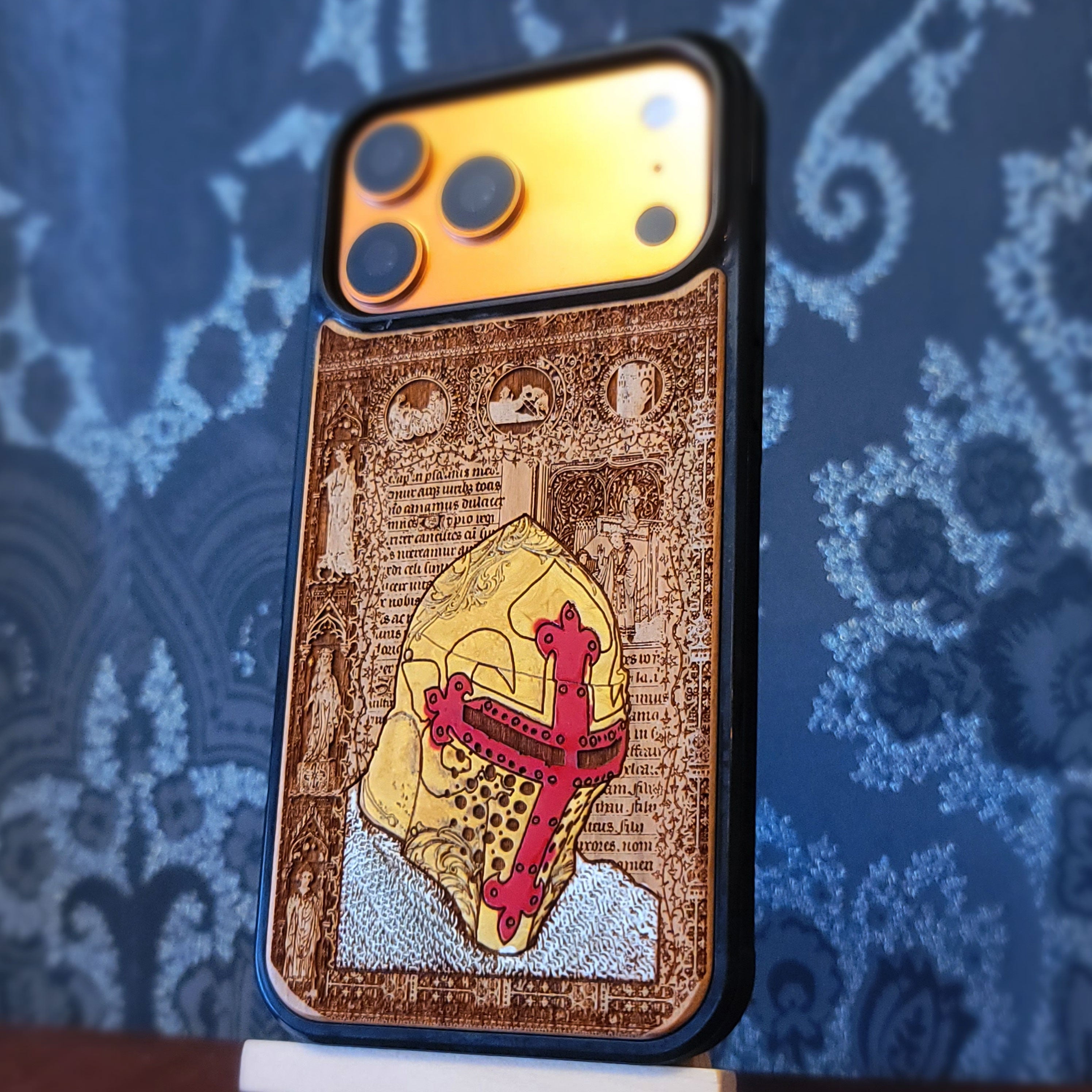 Deep laser engraved wooden phone case featuring a medieval knight in armor on natural wood for iPhone and Samsung Galaxy models.