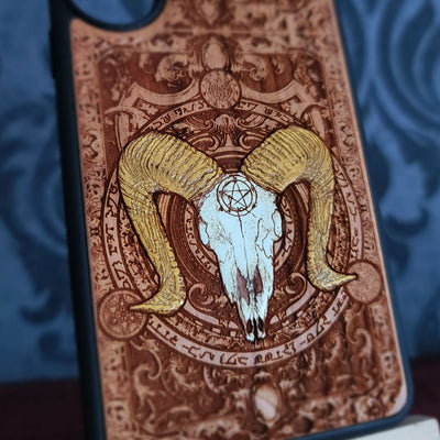Gothic Baphomet phone case with detailed laser engraving on natural wood