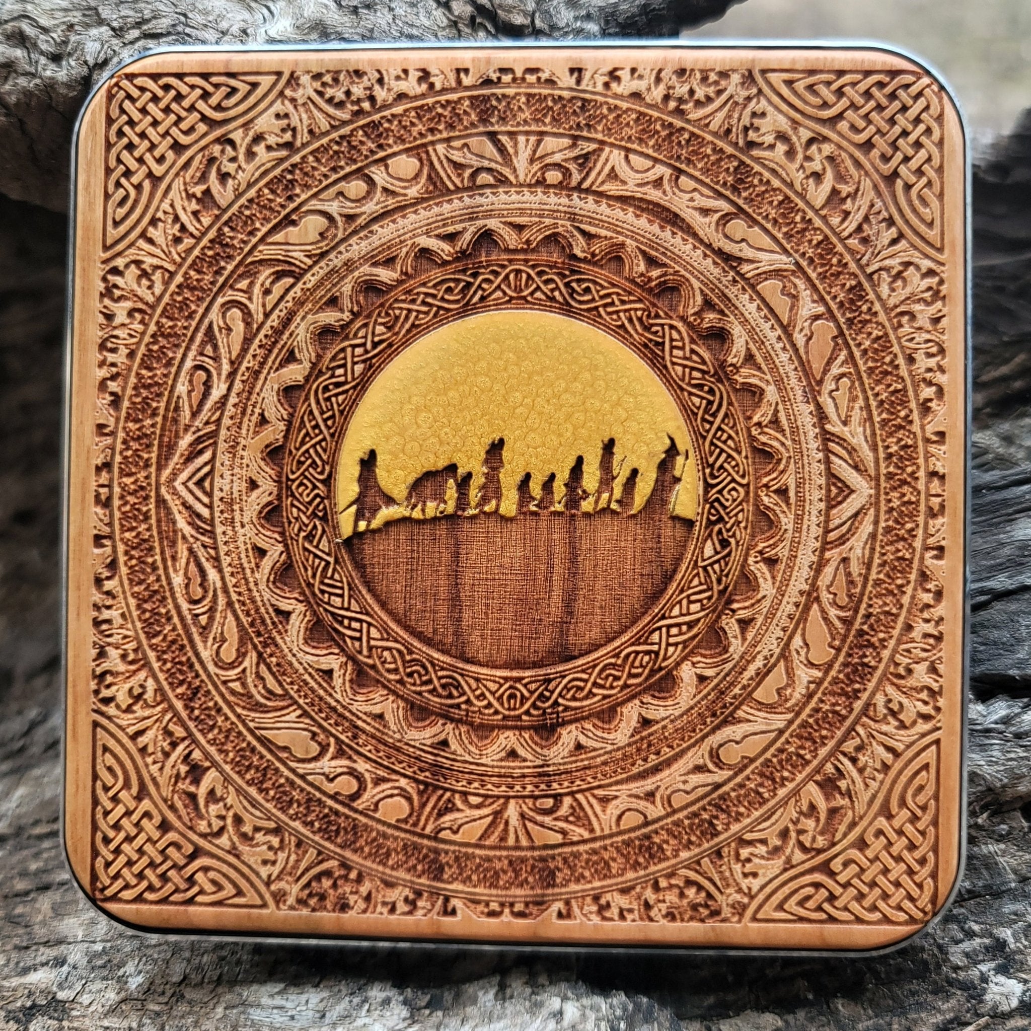 Wooden wireless charger featuring Lord of the Rings fellowship art.