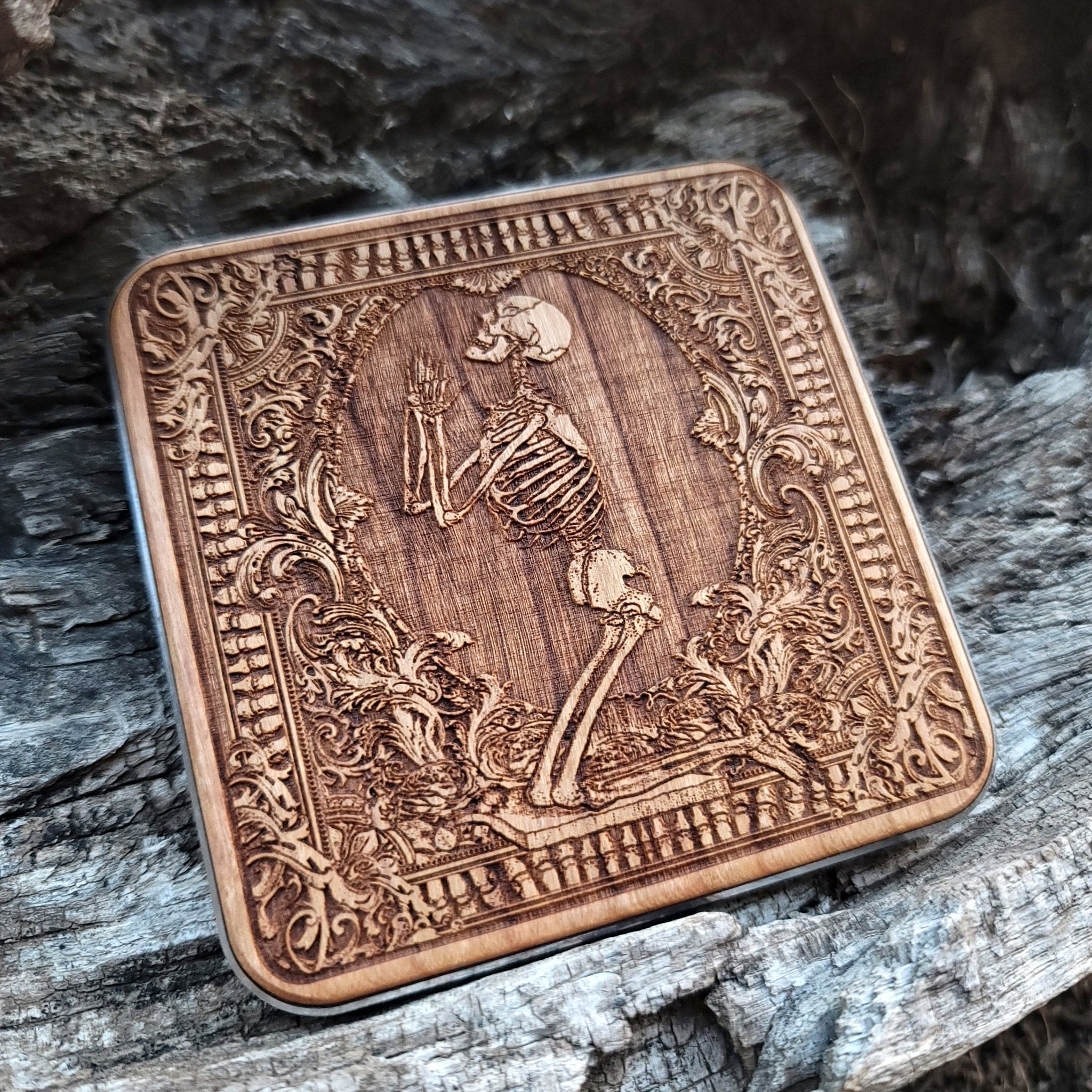 verhead view of symbolic Pray art on wooden wireless charger.