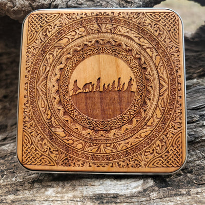 Hand-painted wireless charger with Fellowship of the Ring symbols.