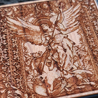 Unique religious wireless charger with detailed St. Michael engraving for smartphones.