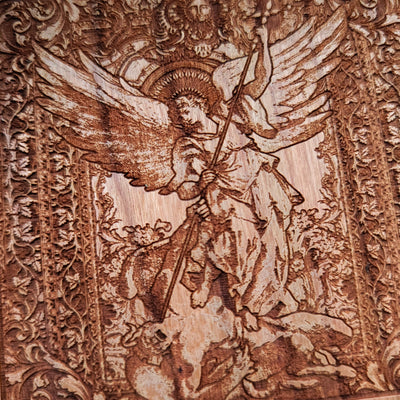 Premium engraved wireless phone charger with St. Michael the Archangel design.