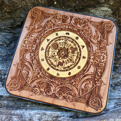 Close-up of gold Triforce painted on Zelda-themed wood charger.