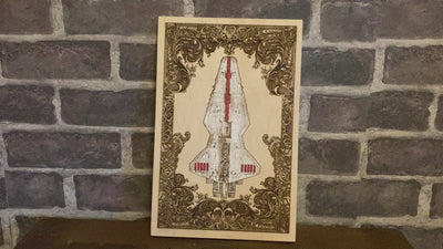 Unique handmade wall decor with sci-fi spaceship engraved on dark wood.