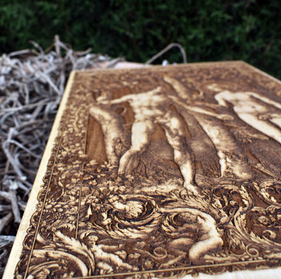 Biblical Adam and Eve wood carving – elegant religious decor for faith-inspired interiors.