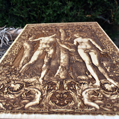 Engraved Adam and Eve biblical artwork on wood – perfect faith-based gift idea.