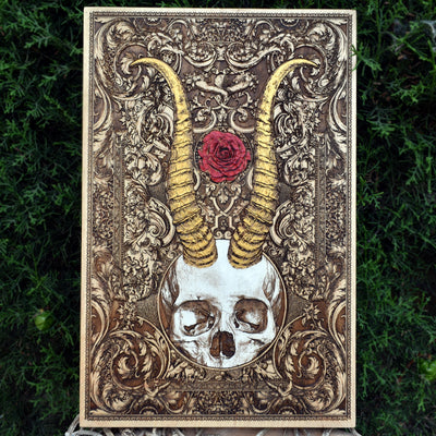 Laser-engraved horned demon skull on wood, perfect for gothic wall decor.