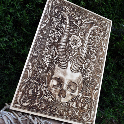 Handcrafted skull and horns gothic wood wall art – perfect gift for gothic decor enthusiasts.