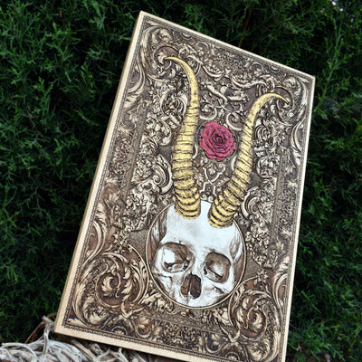 Dark fantasy horned skull engraving, handcrafted wood horror wall art.
