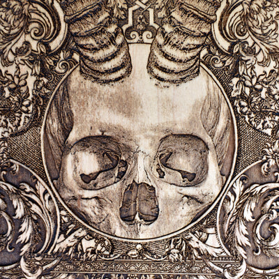 Unique gothic wood art of a horned skull – horror-inspired devil decor for your home or office.