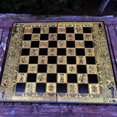 Close-up of engraved Aztec chessboard with intricate patterns, wood stained, perfect for anniversaries