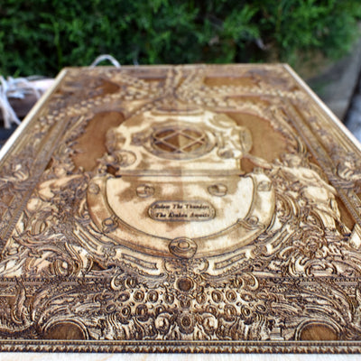 Kraken-themed wooden engraving featuring an antique diving helmet, ideal for maritime and deep-sea enthusiasts.