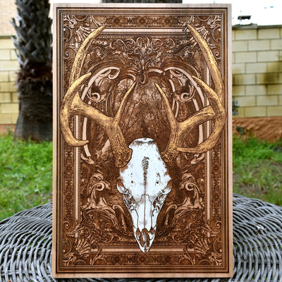 Laser-engraved deer skull on wood, custom wall art for hunters and rustic home decor.