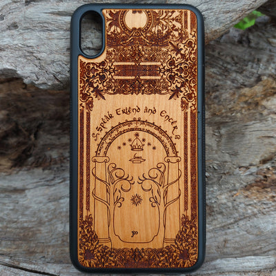 Beautifully engraved wood phone case featuring the iconic Doors of Durin design from Lord of the Rings, compatible with iPhone , Samsung Galaxy S, and other models. Handcrafted with intricate detailing for fans of Tolkien's Middle-earth.