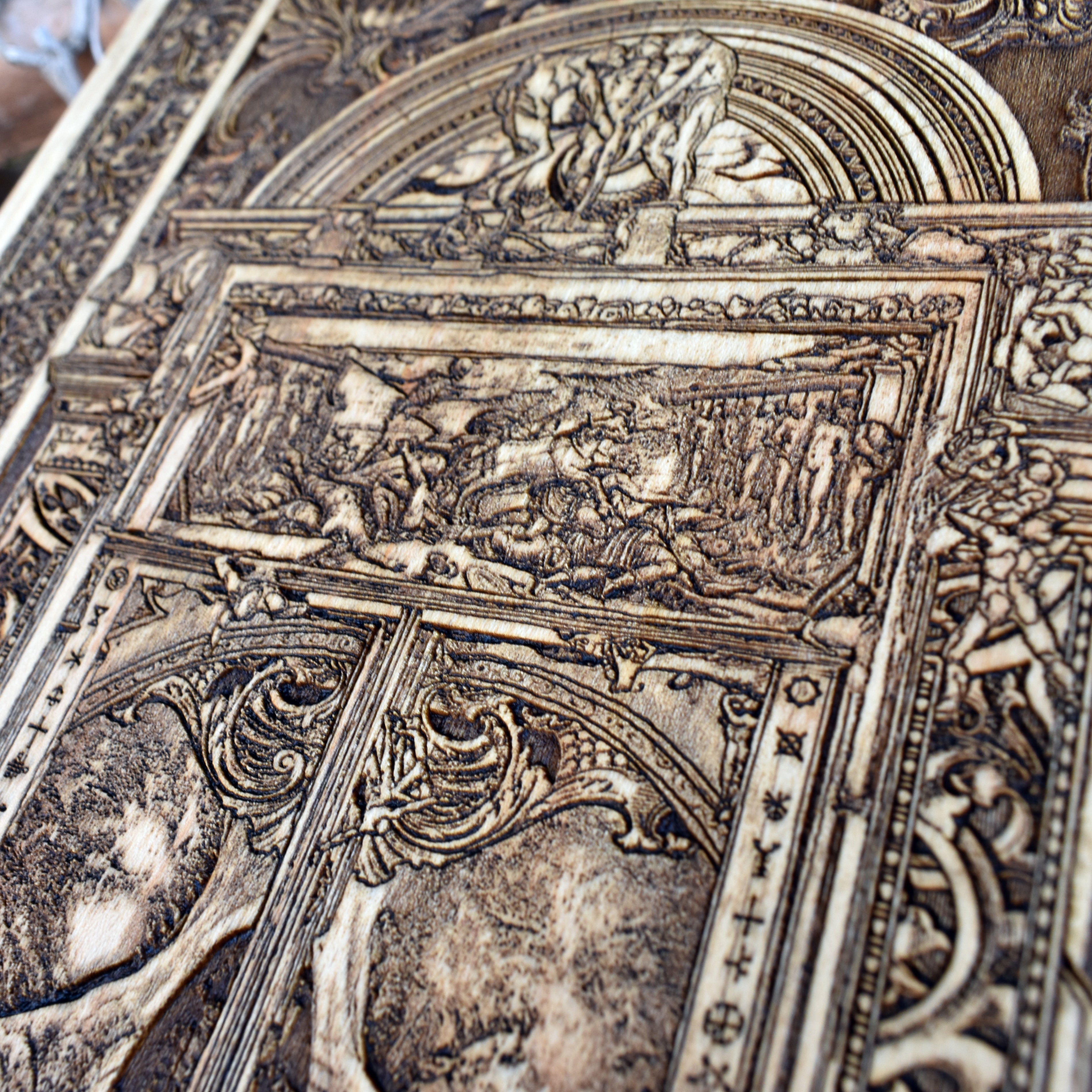 Gothic wood decor with hand-engraved Hell Gate horror design.