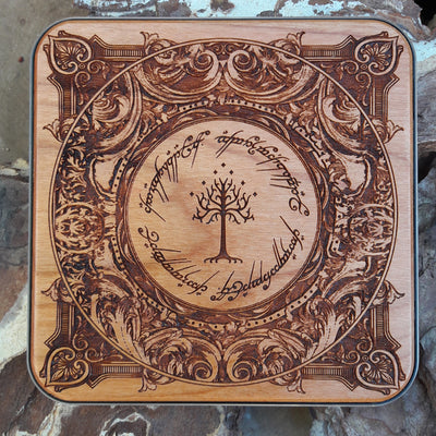Hand-engraved wooden wireless charger featuring Lord of the Rings runes.