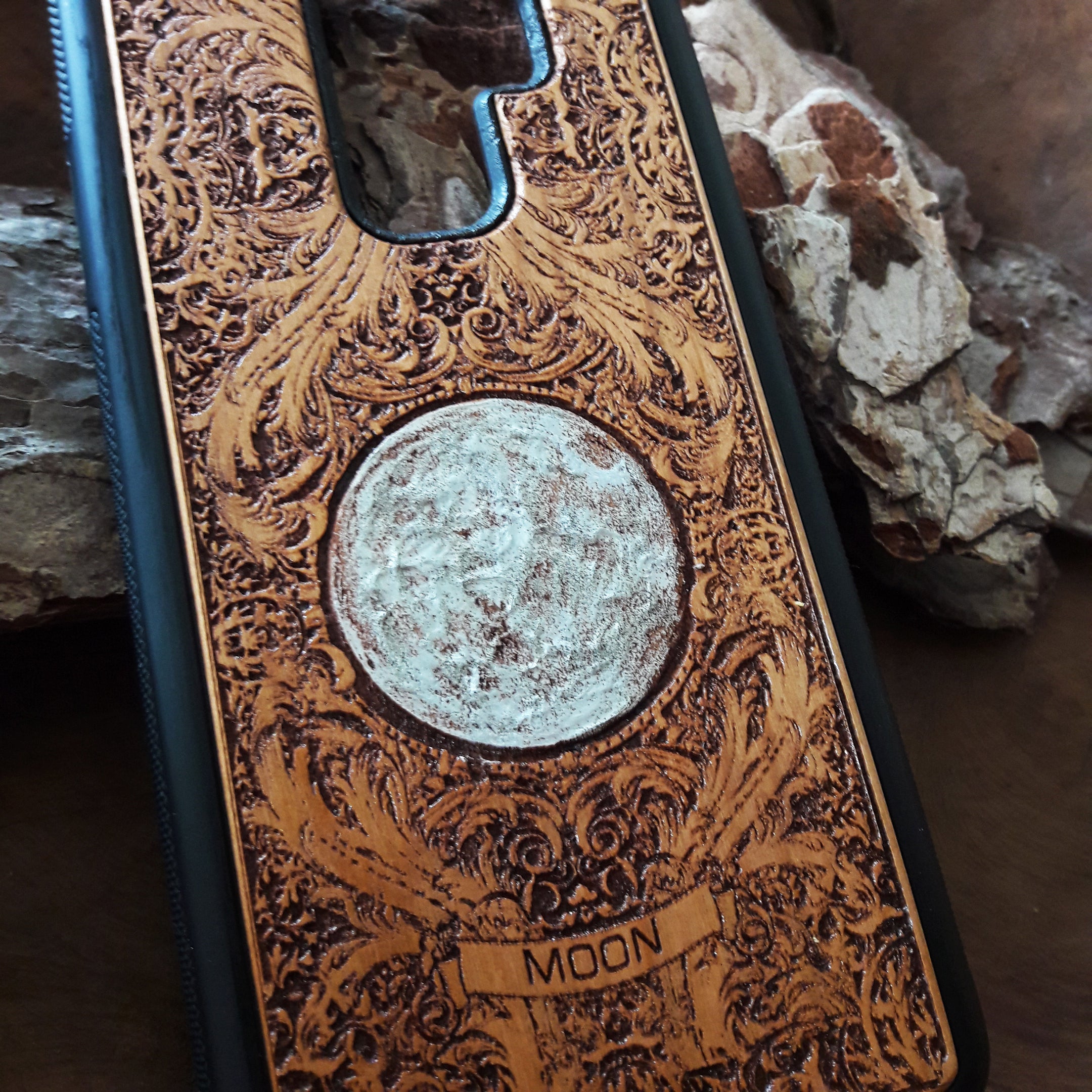 Celestial moon design on premium wooden phone case.