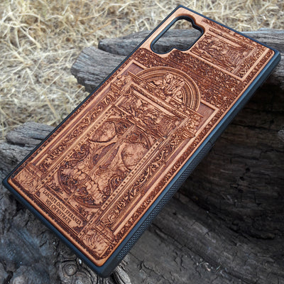 Hell Gate II wooden phone case featuring detailed gothic engravings, perfect for iPhone & Samsung Galaxy. Ideal for dark fantasy fans seeking a custom, protective phone cover.